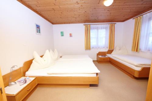 Posteľ alebo postele v izbe v ubytovaní Haus Stablerkrämer