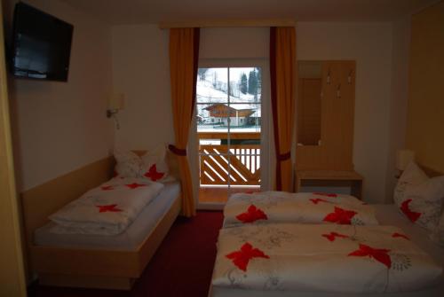 Posteľ alebo postele v izbe v ubytovaní Appartement Tauernhof