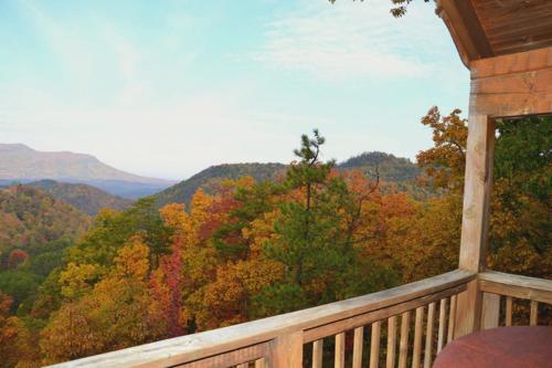 a view of the fall foliage from the deck of a cabin at Honeymoon View #1 in Little Cove