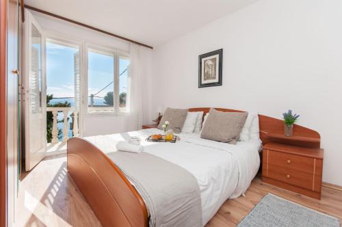 Postel nebo postele na pokoji v ubytování Holiday Home Dalmatino
