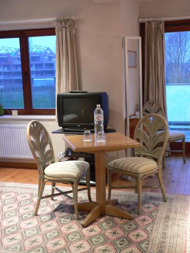 Телевизор и/или развлекательный центр в B&B Le Coquin