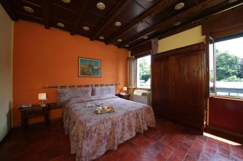 Krevet ili kreveti u jedinici u okviru objekta Hotel Bed and Breakfast Il Granaio Mantova