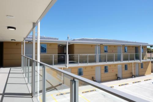 a view from the balcony of a building at Stopforths Motel in Hokitika