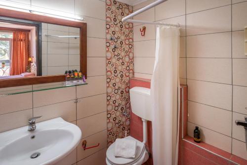 Koupelna v ubytování Jolly Hotel
