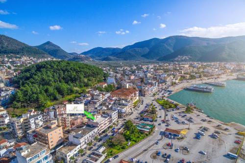 an aerial view of a city next to the water at Jolly Hotel in Igoumenitsa