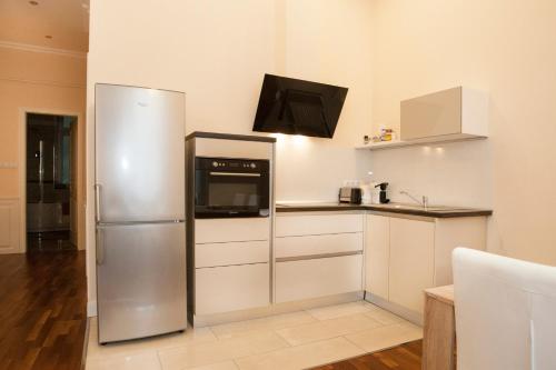 ครัวหรือมุมครัวของ Anna Apartment