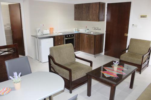 Η κουζίνα ή μικρή κουζίνα στο Petsas Apartments