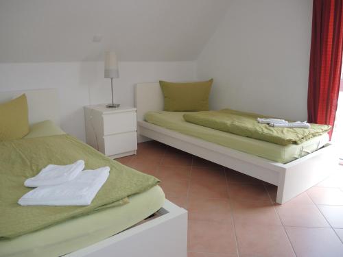 Ein Bett oder Betten in einem Zimmer der Unterkunft Usedom Suites Ückeritz
