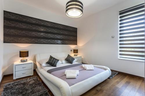 Krevet ili kreveti u jedinici u okviru objekta Sea Pearl Luxury Apartment