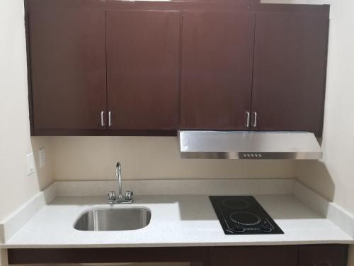 Kuchyň nebo kuchyňský kout v ubytování Scottish Inns & Suites