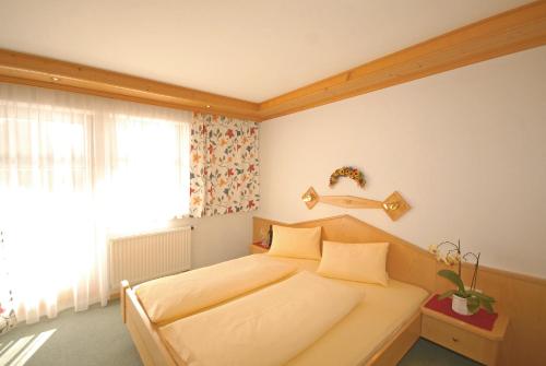 Postel nebo postele na pokoji v ubytování Landhaus Gensbichler