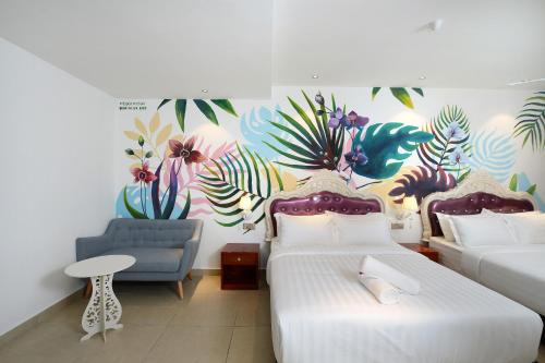 Ένα ή περισσότερα κρεβάτια σε δωμάτιο στο Hotel de Art USJ 21