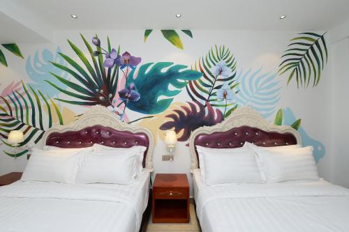 Кровать или кровати в номере Hotel de Art USJ 21