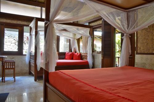 Un ou plusieurs lits dans un hébergement de l'établissement Guci Guesthouses