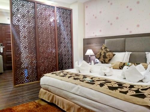 Ένα ή περισσότερα κρεβάτια σε δωμάτιο στο Pearl Retreat