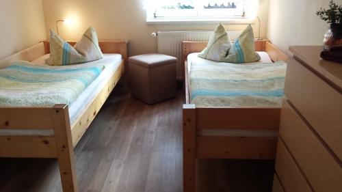 A bed or beds in a room at Ferienwohnung Am Elbradweg