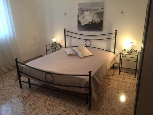 Ліжко або ліжка в номері Antico Borgo