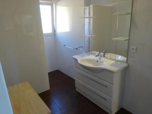 Ett badrum på Residence Monte Cristo