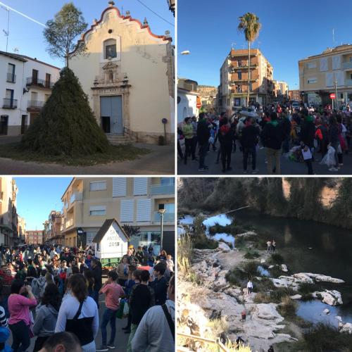a group of people walking down a city street at Casa del Agua in Anna