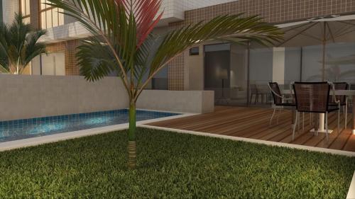 una representación de una casa con una palmera en Apartamento Cabo Branco, en João Pessoa