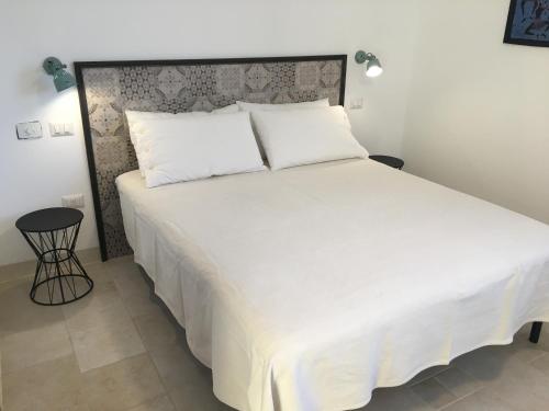 Postel nebo postele na pokoji v ubytování Villa Pietraja