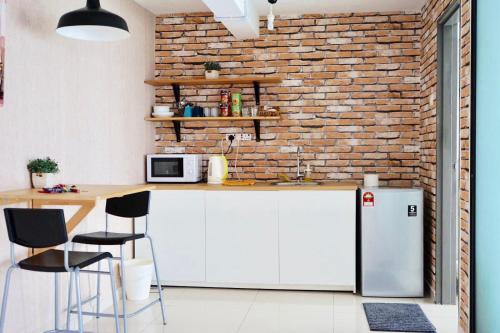 Kuchyň nebo kuchyňský kout v ubytování Chrisenbel Suites - Pinnacle PJ
