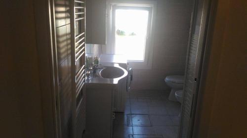 Un baño de House on the water Murano