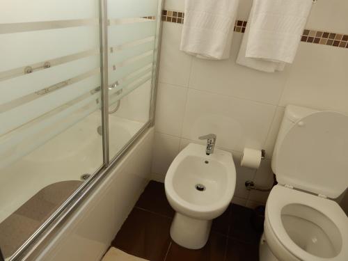 Koupelna v ubytování Guesthouse Coimbra City