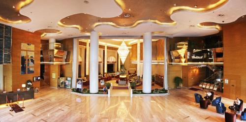 Majoituspaikan Grand Metropark Hotel Suzhou kuntosali tai liikuntatilat