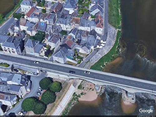 an overhead view of a city with houses and a road at Villa Mary in Amboise