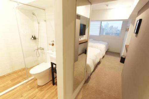 Kylpyhuone majoituspaikassa Daan Park Hotel