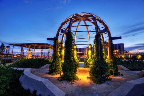 a roller coaster in a park at night at De Houz @ Setia Alam Trefoil Homestay in Shah Alam