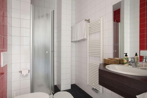 Een badkamer bij Boutique Hotel De Raetskamer