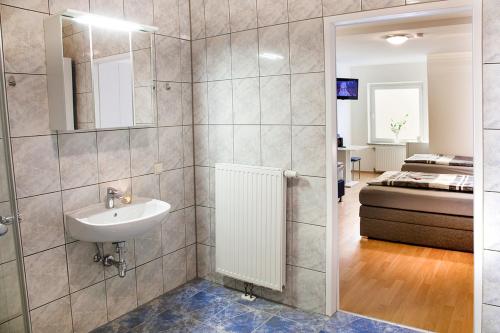 Koupelna v ubytování Das Quartier