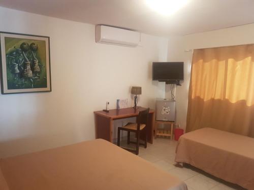 Postel nebo postele na pokoji v ubytování Archotel