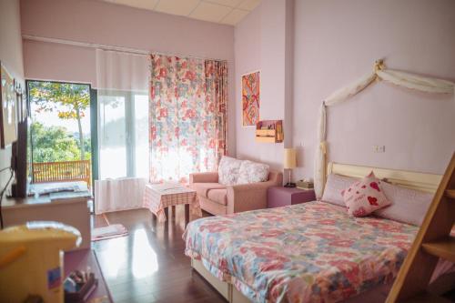 Postel nebo postele na pokoji v ubytování Lowkey B&B 低調民宿