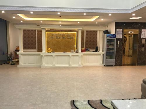 a lobby with a counter in the middle of a room at Hotel Ngoc Anh - Van Don in Quang Ninh