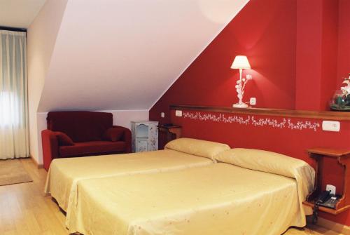 Ένα ή περισσότερα κρεβάτια σε δωμάτιο στο Hotel Conventin