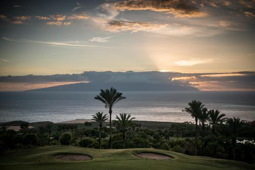 a view of the ocean from a golf course at Las Terrazas de Abama Suites in Guía de Isora