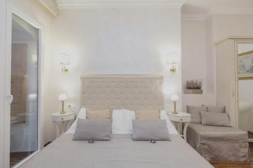 Postel nebo postele na pokoji v ubytování Locanda Navona