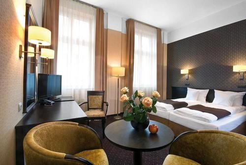 Posteľ alebo postele v izbe v ubytovaní Hotel Senator