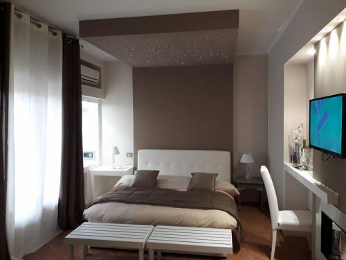 Postel nebo postele na pokoji v ubytování Rocca Di Monreale
