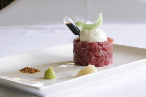 a dessert on a white plate on a table at Boutique Hotel Slenaker Vallei - Buitengewoongenieten in Slenaken