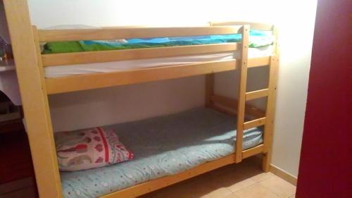 a couple of bunk beds in a room at Le Refuge in Puivert