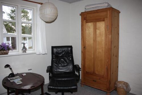 Un lugar para sentarse en Holmehuset Bed & Breakfast