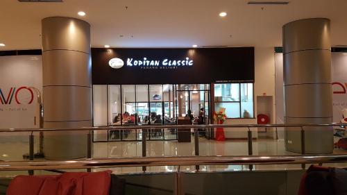 a shopping mall with a sign that reads kronen impulse at EVO SOHO STUDIO Suites in Kampong Sungai Ramal Dalam