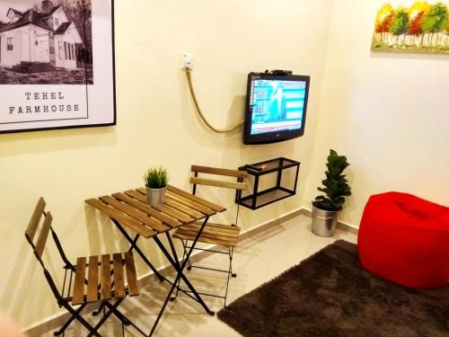 TV a/nebo společenská místnost v ubytování Tehel Farmhouse