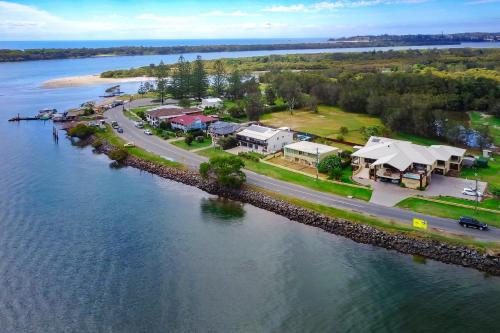 an aerial view of a resort next to the water at Ana Mandara Luxury Retreat in Port Macquarie