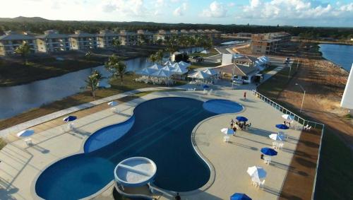 an aerial view of a swimming pool at a resort at Apto Villa das Aguas in Estância