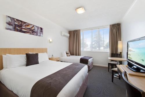 Voodi või voodid majutusasutuse Comfort Inn Capital Horsham toas